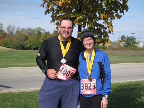 Erin Wilding-Martin and Vance Martin pose after the 2009 Indianapolis Half Marathon in Lawrence, IN