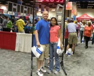 Valeria and Jeff Rohde stand at the 0-mile marker at the One America 500 Festival in Indianapolis, IN in 2010