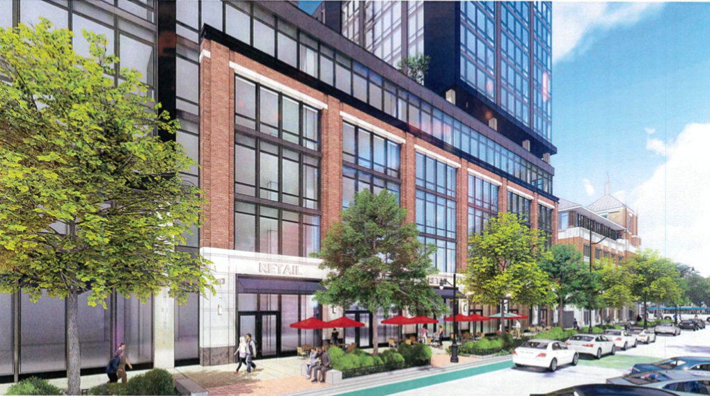 Image: Conceptual rendering of a new building with brick and black metal faÃ§ade. There are many windows on the building. On the sidewalk in front of the building, there are red umbrellas for seating. There are rows of cars alongside the sidewalk. Photo from City of Champaign's council report.