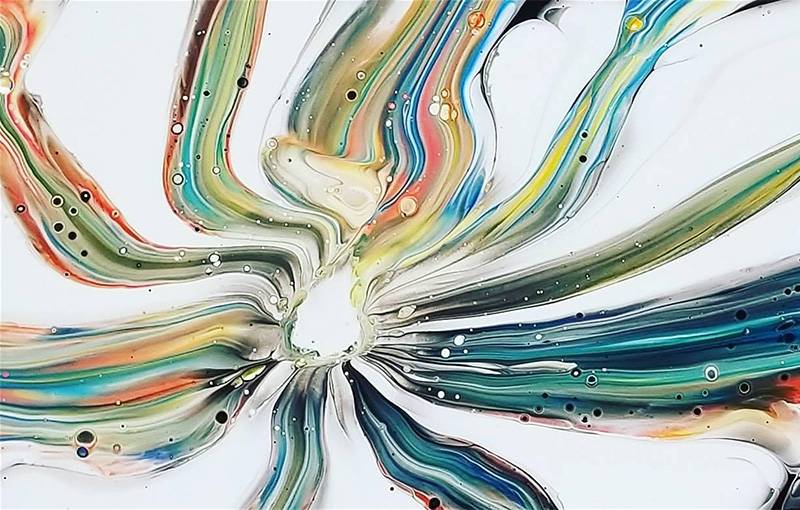 Image: Photo of colorful acrylic painting containing streams of color extending out from a central point. Image from Facebook event page.