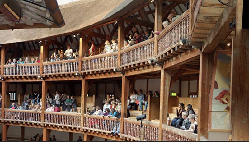 Image: Photo of crowds in the upper stands at London's Globe Theatre. Photo from Globe Theatre's website