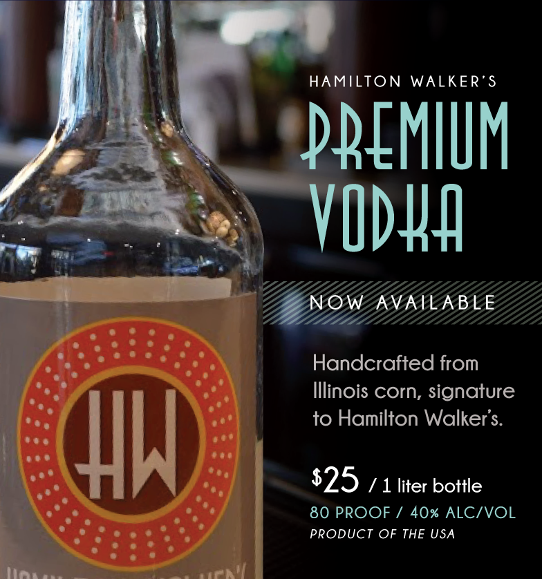 A portion of a bottle of vodka. It has a beige label with the Hamilton Walker's logo; and orange circle with a red circle inside of it and HW in white. Image from Hamilton Walker's. 
