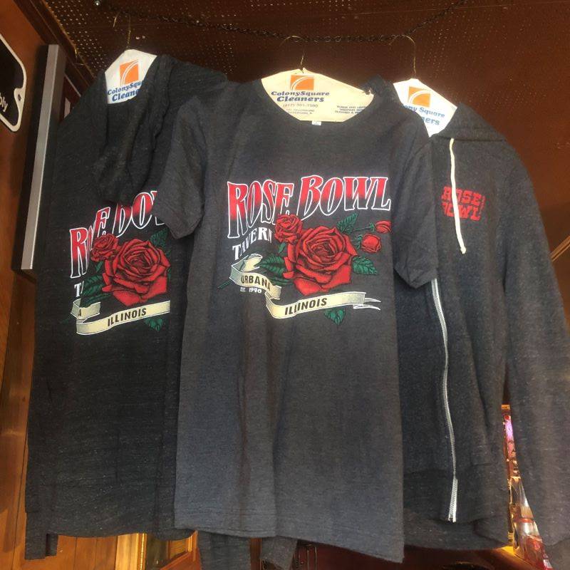 A gray t-shirt, long sleeve t-shirt, and sweatshirt with a red rose and Rose Bowl Tavern on the front. 