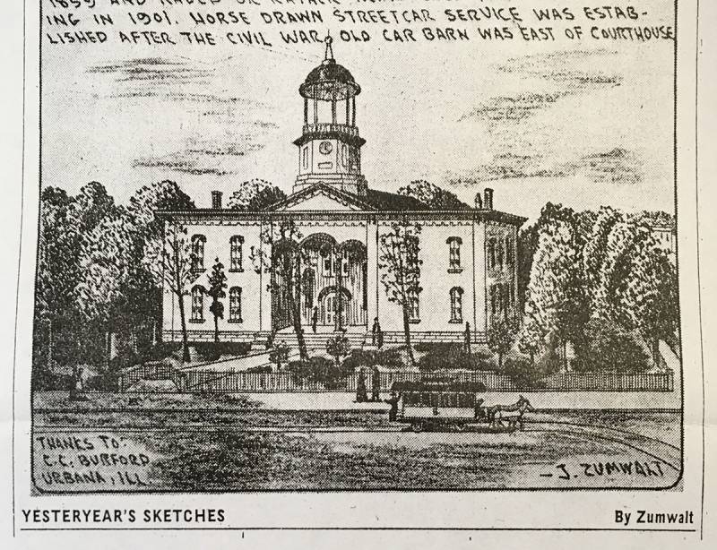 Black and white sketch of the 1859 Courthouse, facing south, surrounded by trees.  Two stories with a center cupola.  A horse-drawn trolley crosses the front on Main Street.  Sketch is by J. Zumwalt with thanks to C. C. Burford printed in the bottom left corner.  From the files of the Champaign County History Museum.