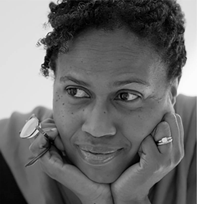 Image: Black and white photo close up of poet Janice N. Harrington. Photo by Rachel Eliza Griffiths.