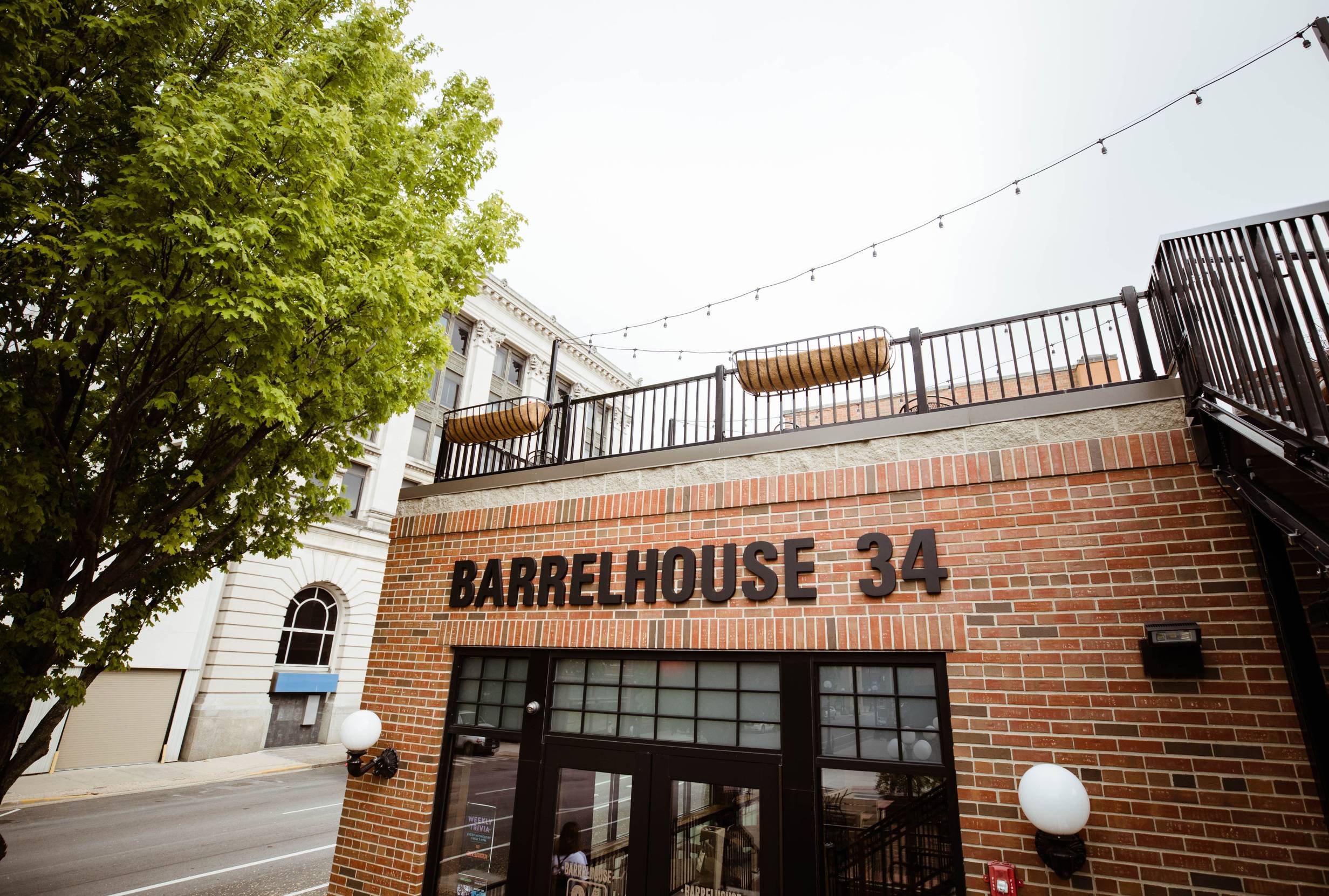 The exterior of Barrelhouse 34 is a brick building with a second floor for additional seating. Photo by Anna Longworth.