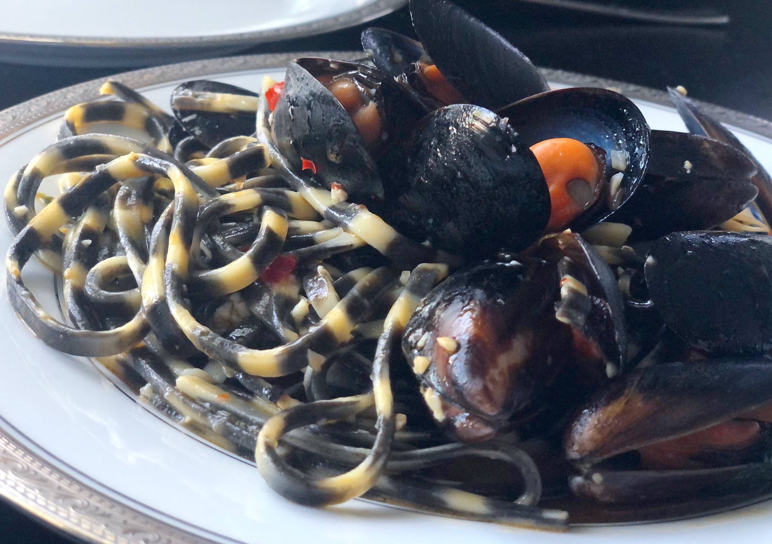 Check out NAYA's squid ink pasta with mussels - Smile Politely —  Champaign-Urbana's Culture Magazine