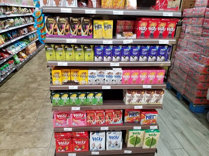 Aisle endcap full of boxes of Pocky, a branded crispy stick half-dipped in flavored chocolate. Photo by Matthew Macomber.