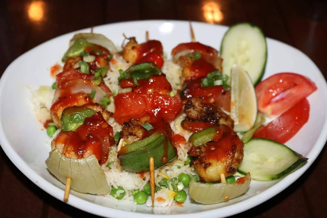 Shrimp shaslik is a grilled shrimp appetizer served on skewers. Photo by Ujjwal Ghimire.