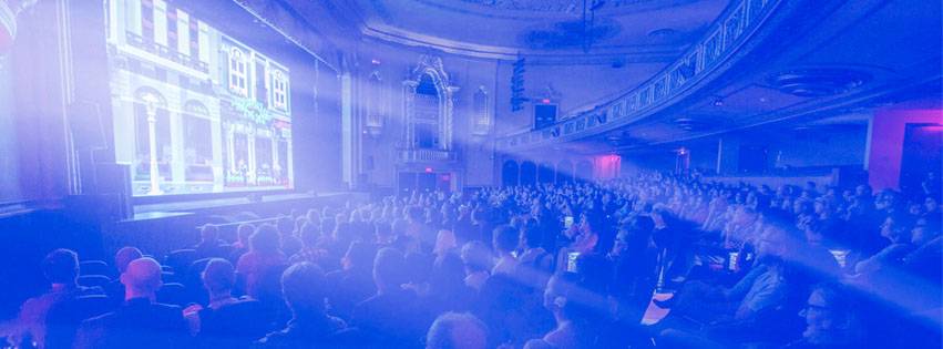 Photo of audience at the Virginia Theatre. Photo from Pens to Lens website 