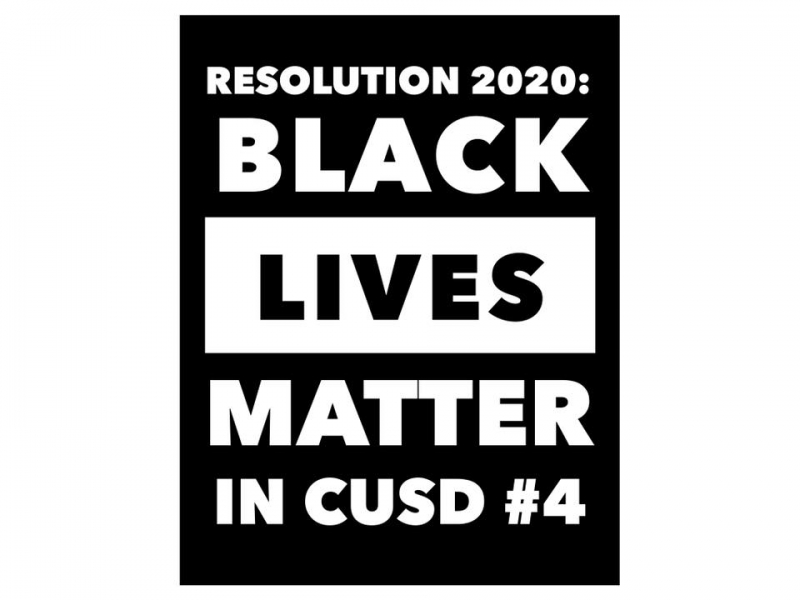 A black sign with white lettering that says: Resolution 2020, Black Lives Matter in CUSD #4. Image from Facebook.