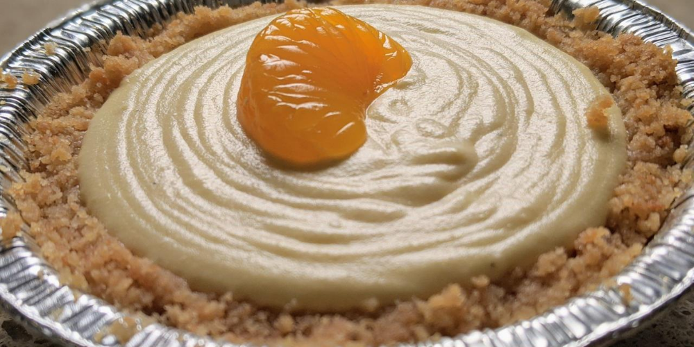 Orange Dreamsicle pie from Oh Honey Pie in Champaign with a slice of mandarin orange on top. Photo by Thomas Nicol.