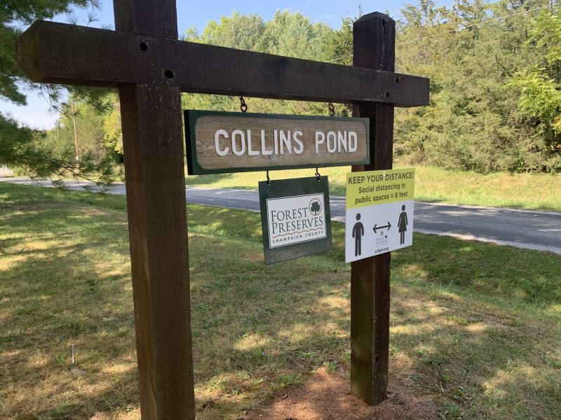 A sign that states Collins Pond .
