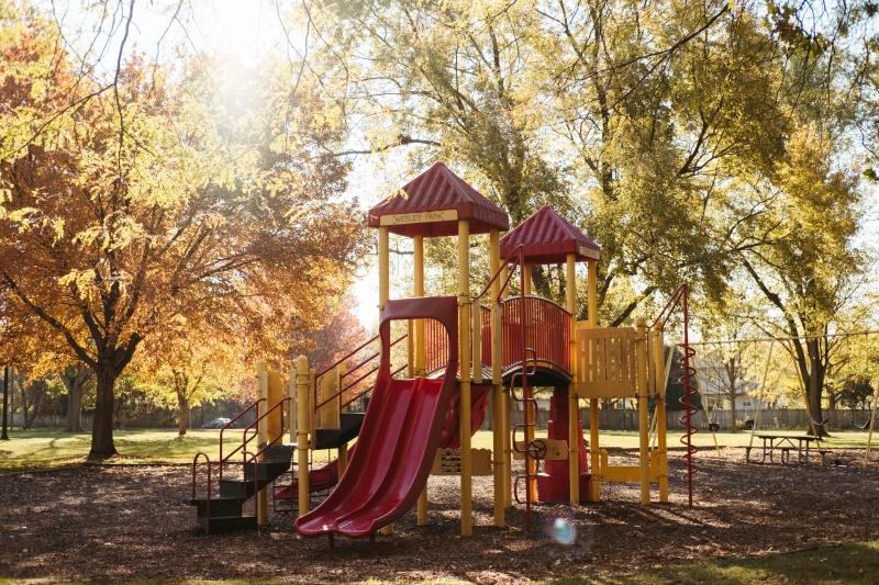 a yellow and red playground for children 