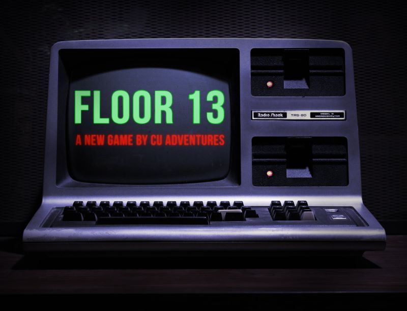 A graphic with an old computer, the screen saying FLOOR13, a new game by CU Adventures.