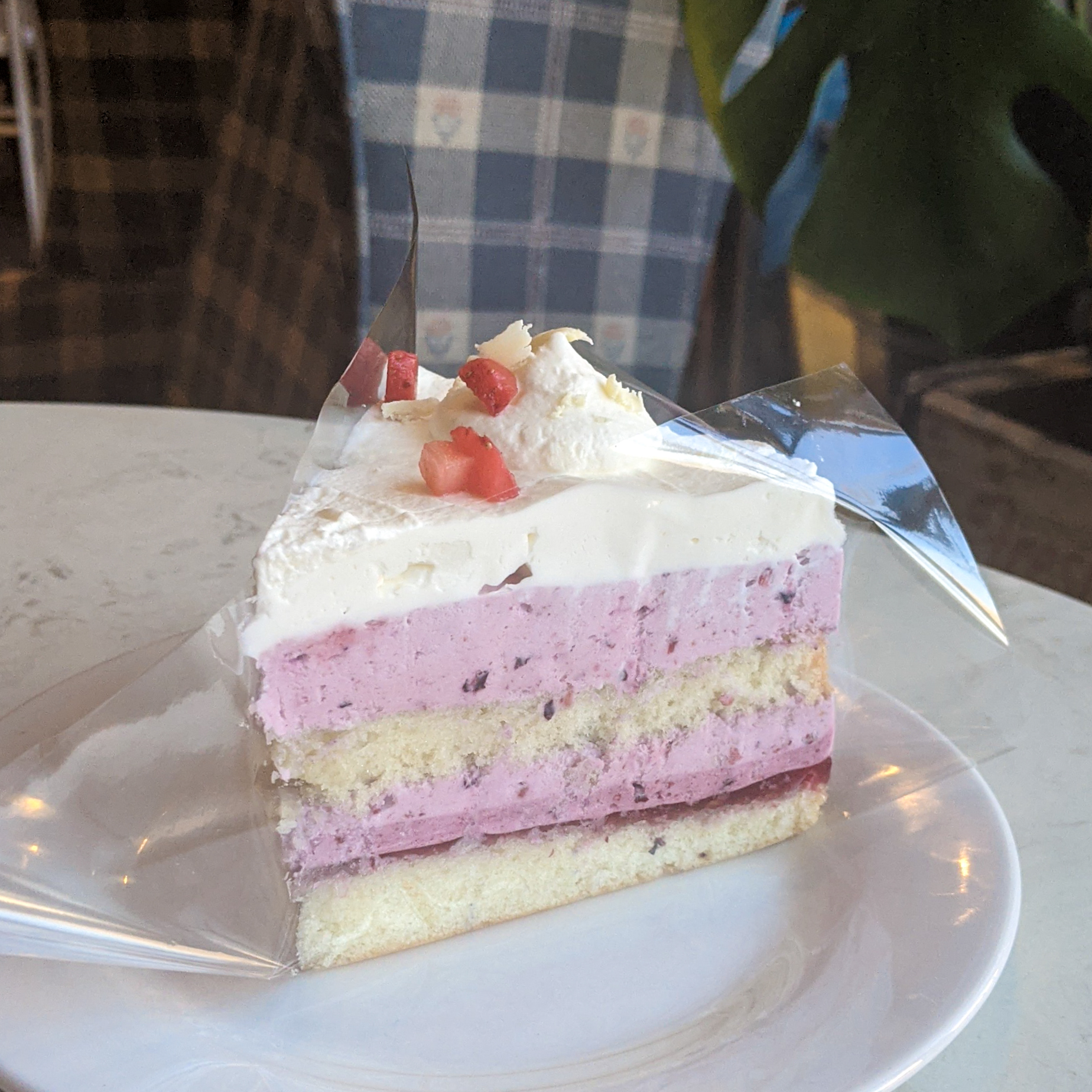 A homemade strawberry cake from Caffe Paradiso on a clear small plate. Photo provided by Caffe Paradiso.