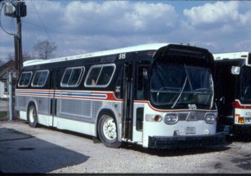 A vintage white and silver bus with red and blue detailing. BusTalk U.S. Surface Transportation Galleries.