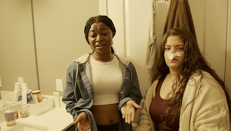 Still of a scene from the BFA Acting Showcase. From left to right: Uche Nwansi, Charlee Amacher. Photo courtesy of Fabian Guerrero.