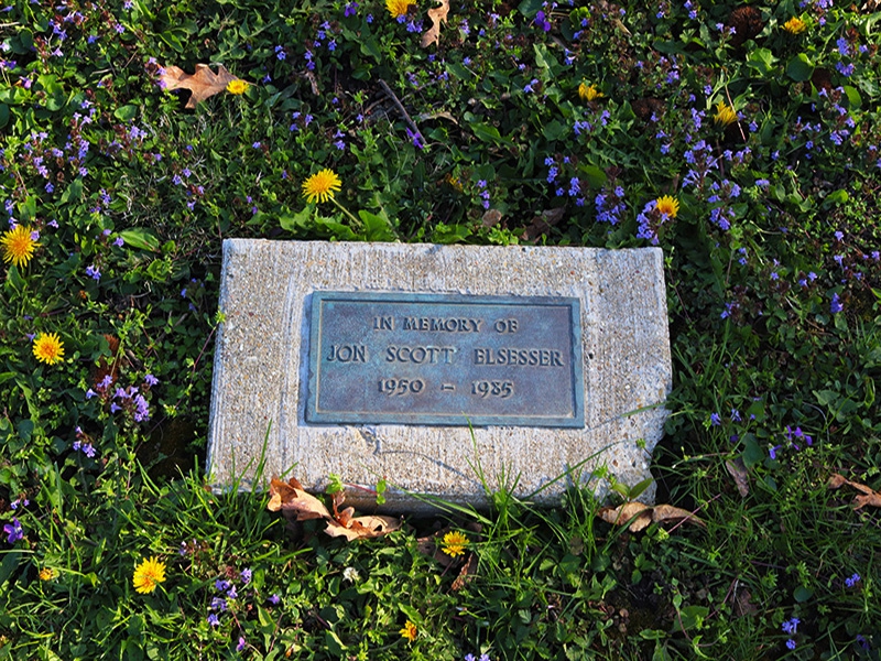 a stone marker honoring someone's life 