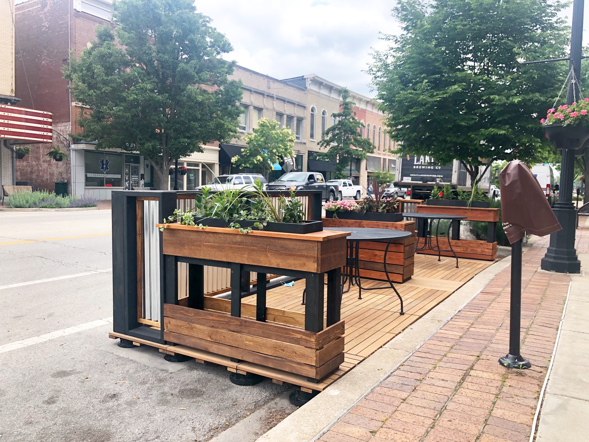 Outdoor public seating in Downtown Urbana called Curbanas are assembled in front on Nola's Rock Bar. Photo by Alyssa Buckley.