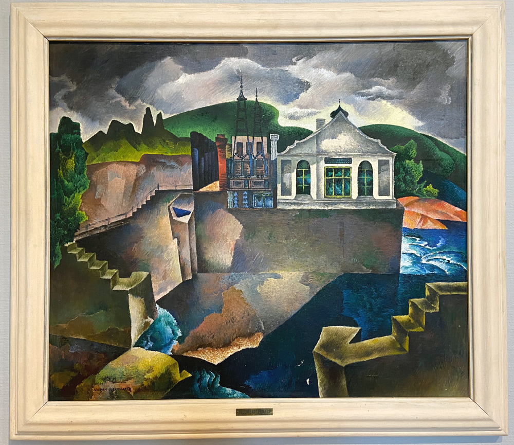 William S. Schwartz, The Power Plant, oil on canvas, 1936. This painting is done in a quasi-Cubist style, with rich, saturated colors. It pictures a green landscape with trees and hills on the left side, and a blue river on the right side. In the middle is a power plant and concrete stairs. Photo by Jessica Hammie. 