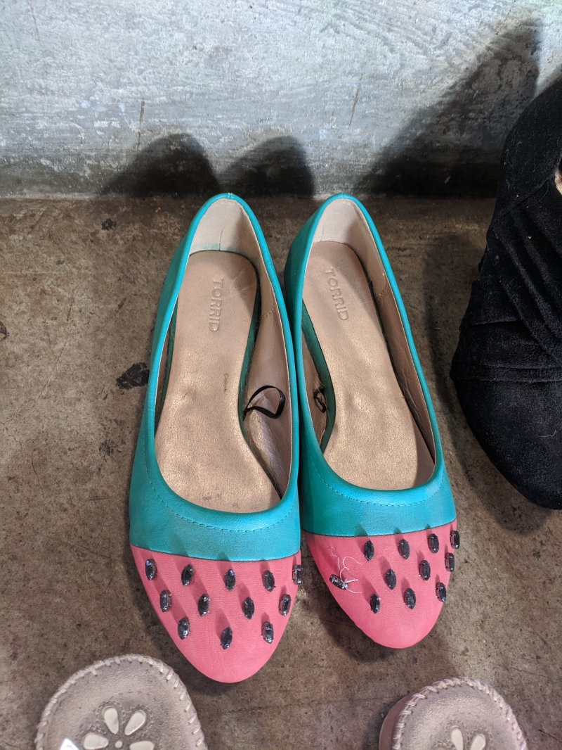 Women's flats that are green and pink with black jewels, made to look like watermelon. Photo by Tom Ackerman. 