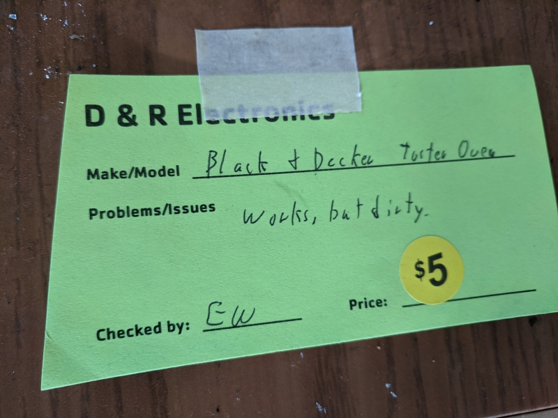 A green sign that says D&R Electronics at the top. The make and model as listed, and under problems/issues it ways 