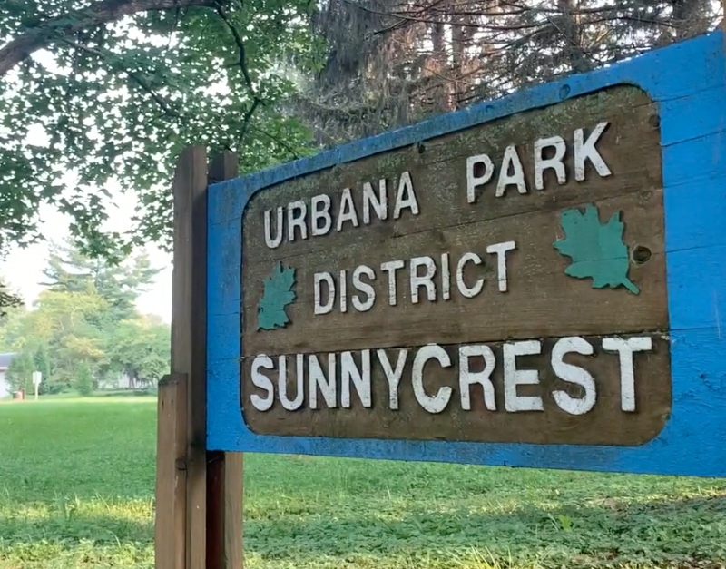 a wooden sign that states Urbana Park District Sunnycrest 