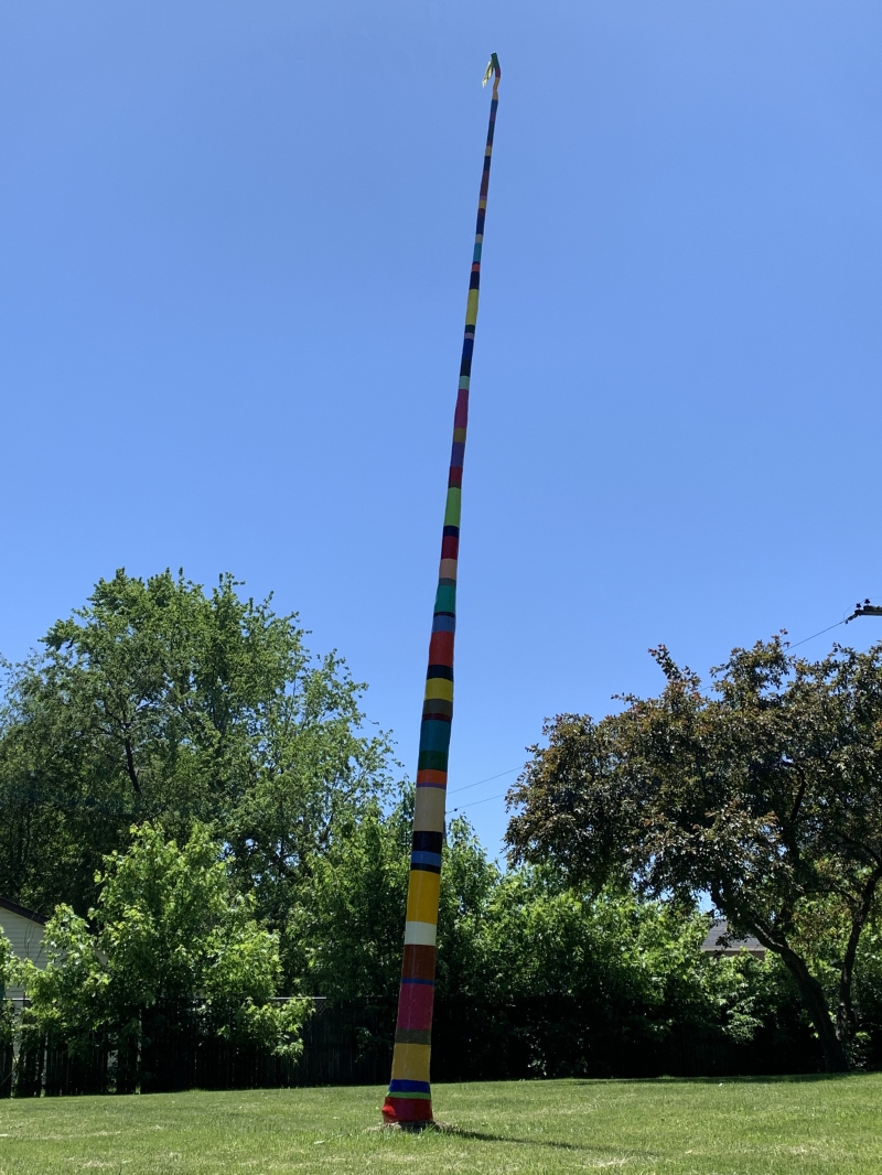 a totem pole piece of art in citizen's park