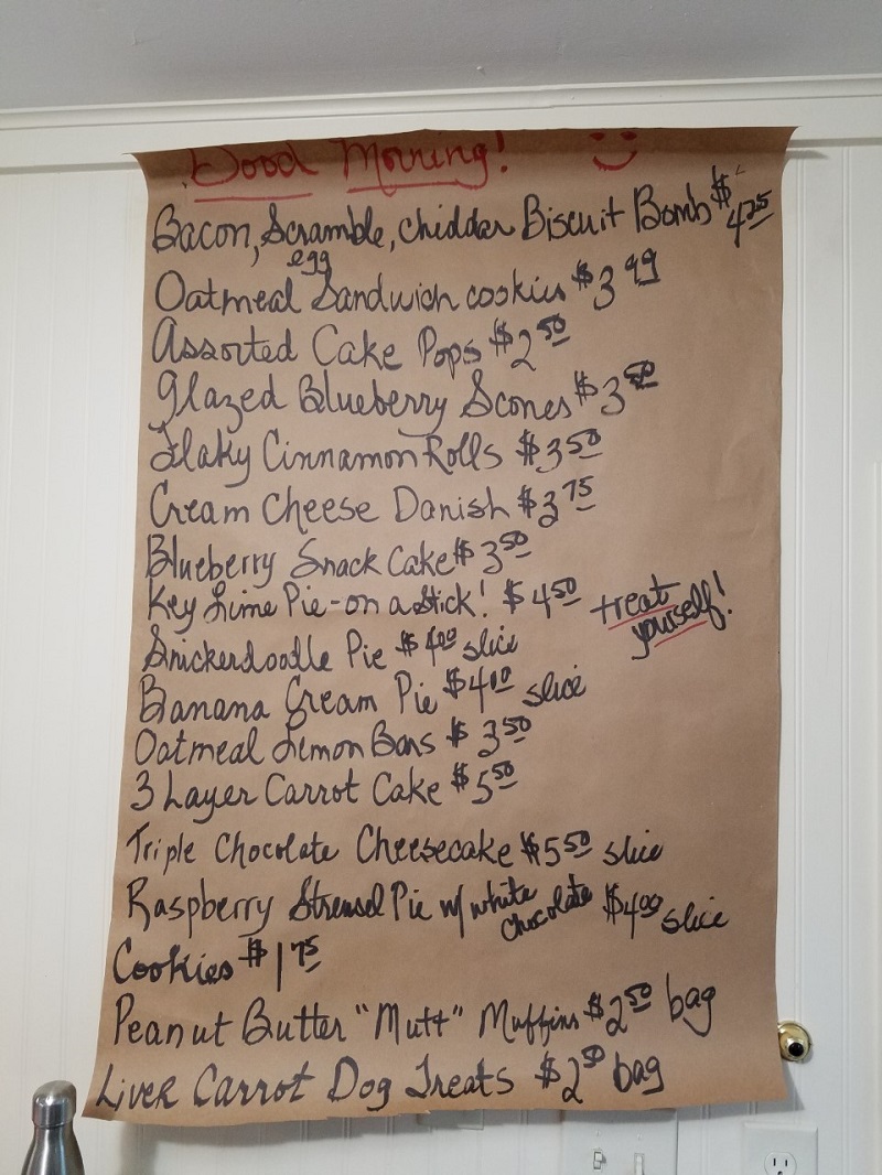 A paper printed version per printed version of the outdoor menu with the same items listed. Photo by Matthew Macomber.