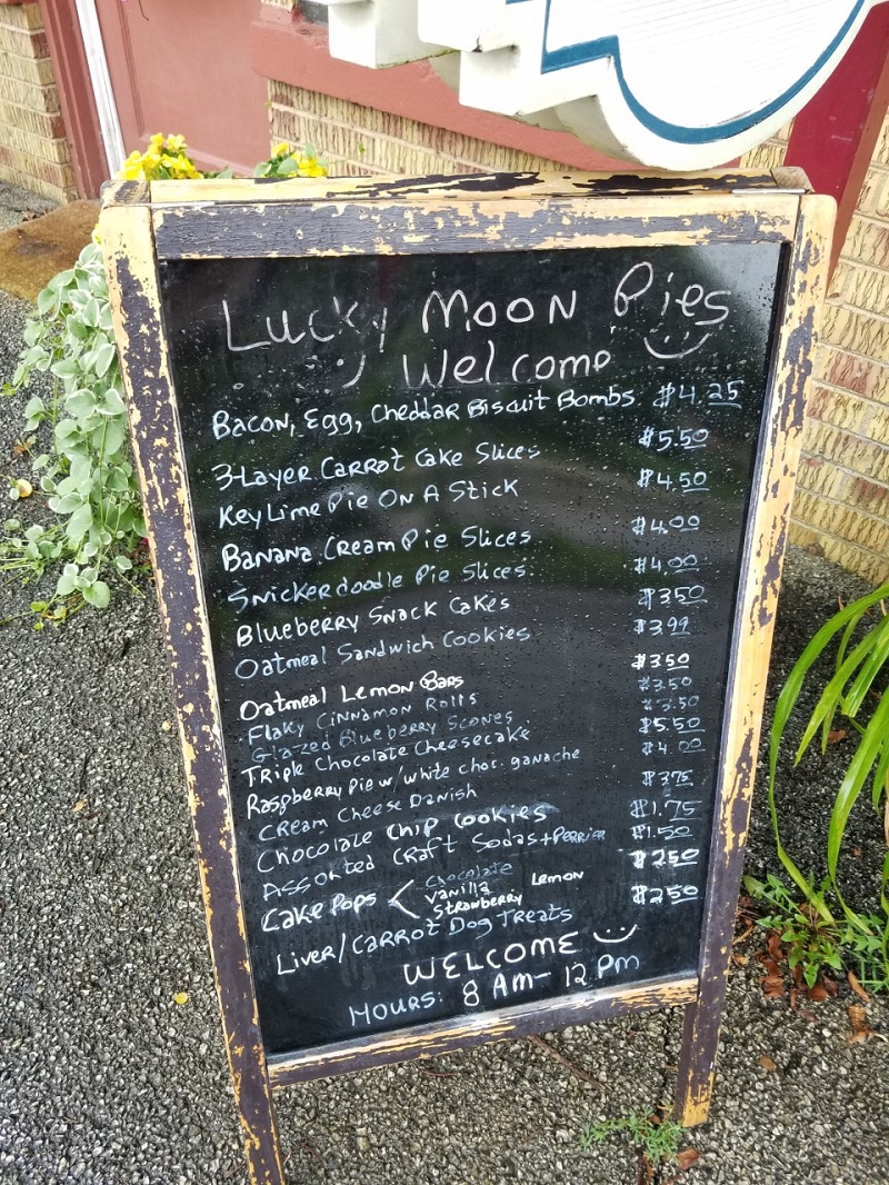 The exterior menu on the ground showing baked goods priced from $1.75 to $5.50. Photo by Matthew Macomber.
