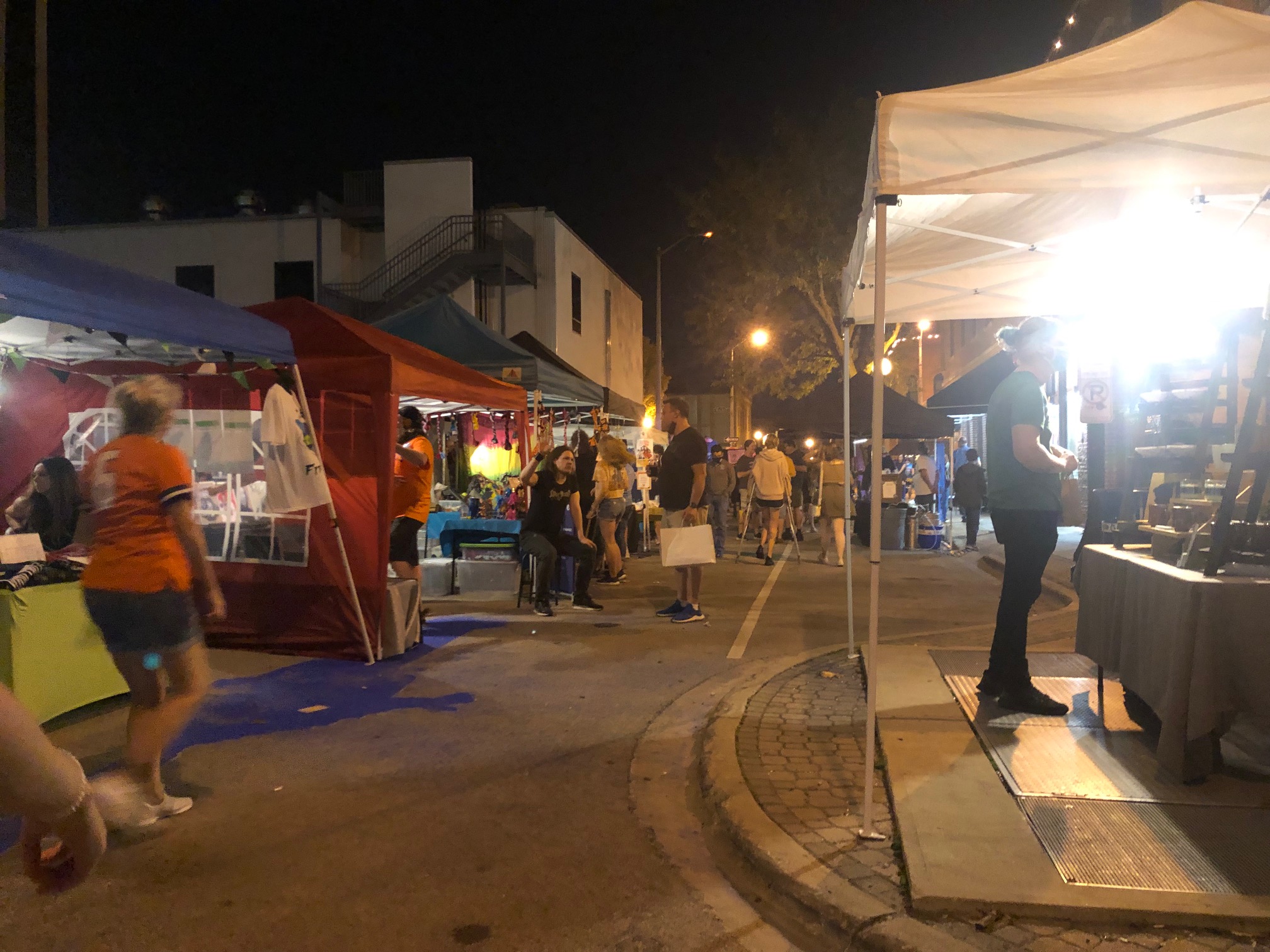 At night, there are vendor tents for Toast to Taylor Street and shoppers browsing the open air market. Photo by Alyssa Buckley.
