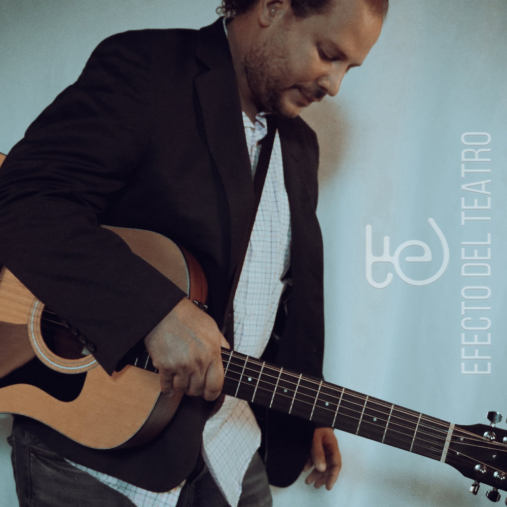 Album cover of Efecto del Teatro. The lead singer faces sideways holding his guitar, looking down. 