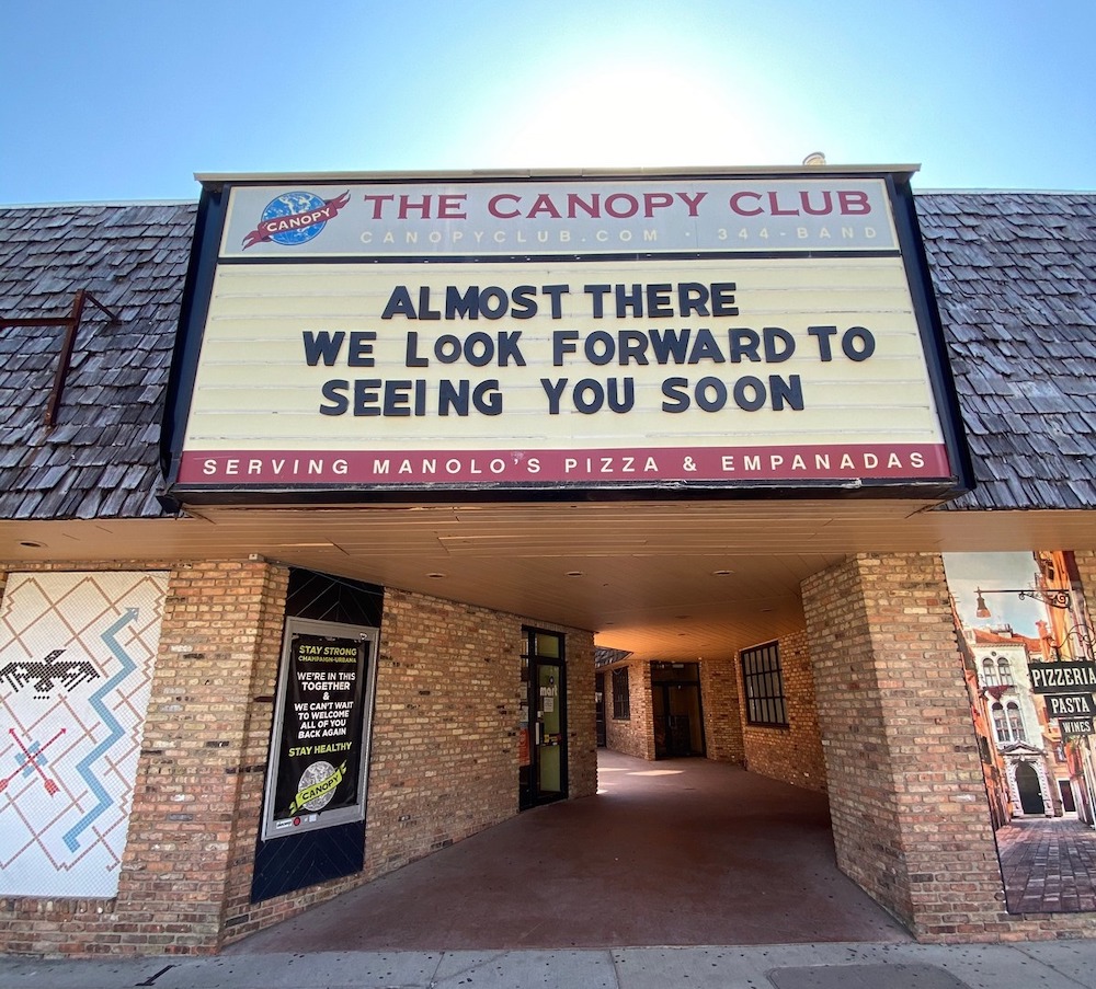 Image of the front of the Canopy Club. The marquee says 
